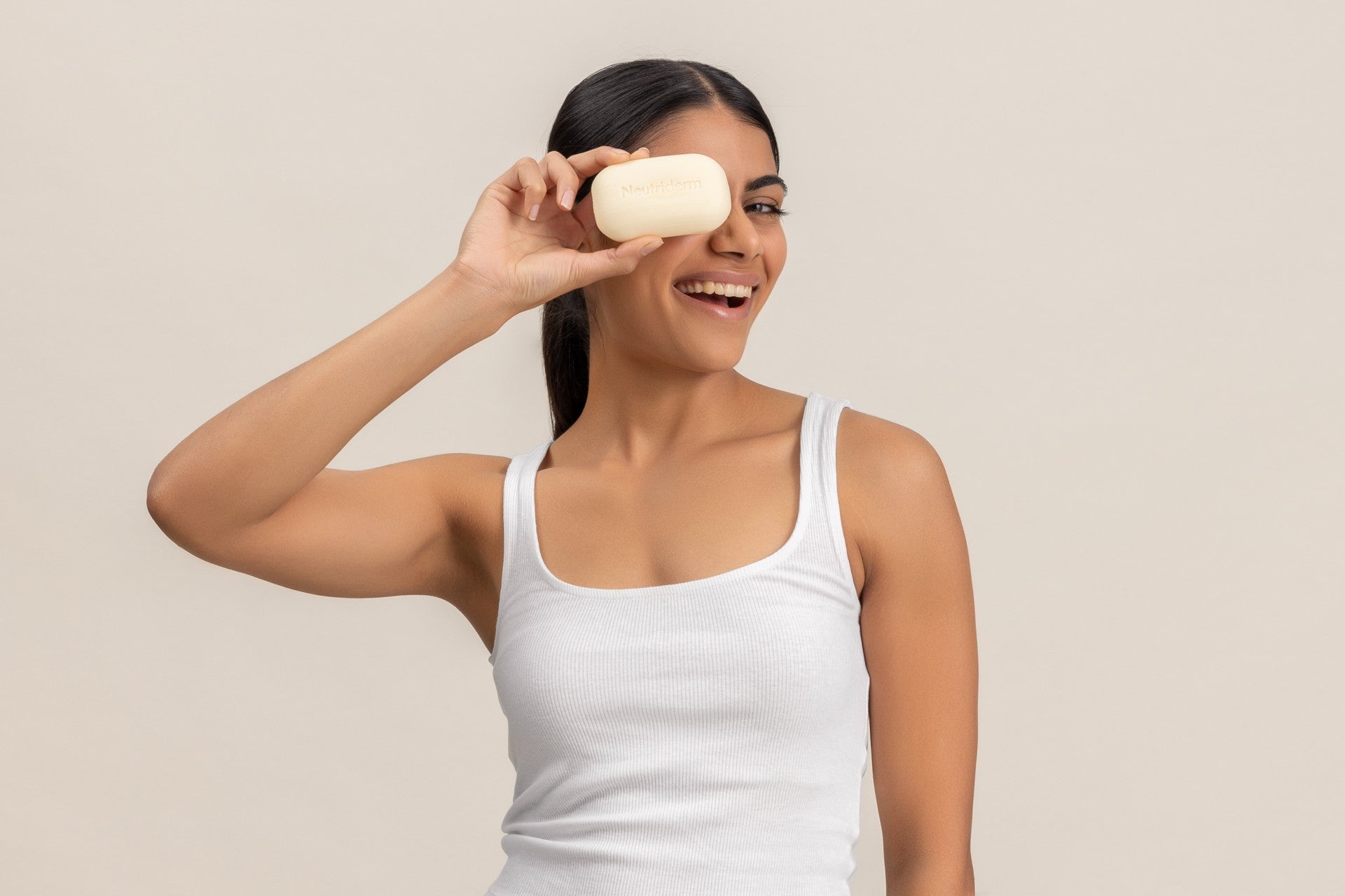 A model with the Neutriderm Brightening Bar