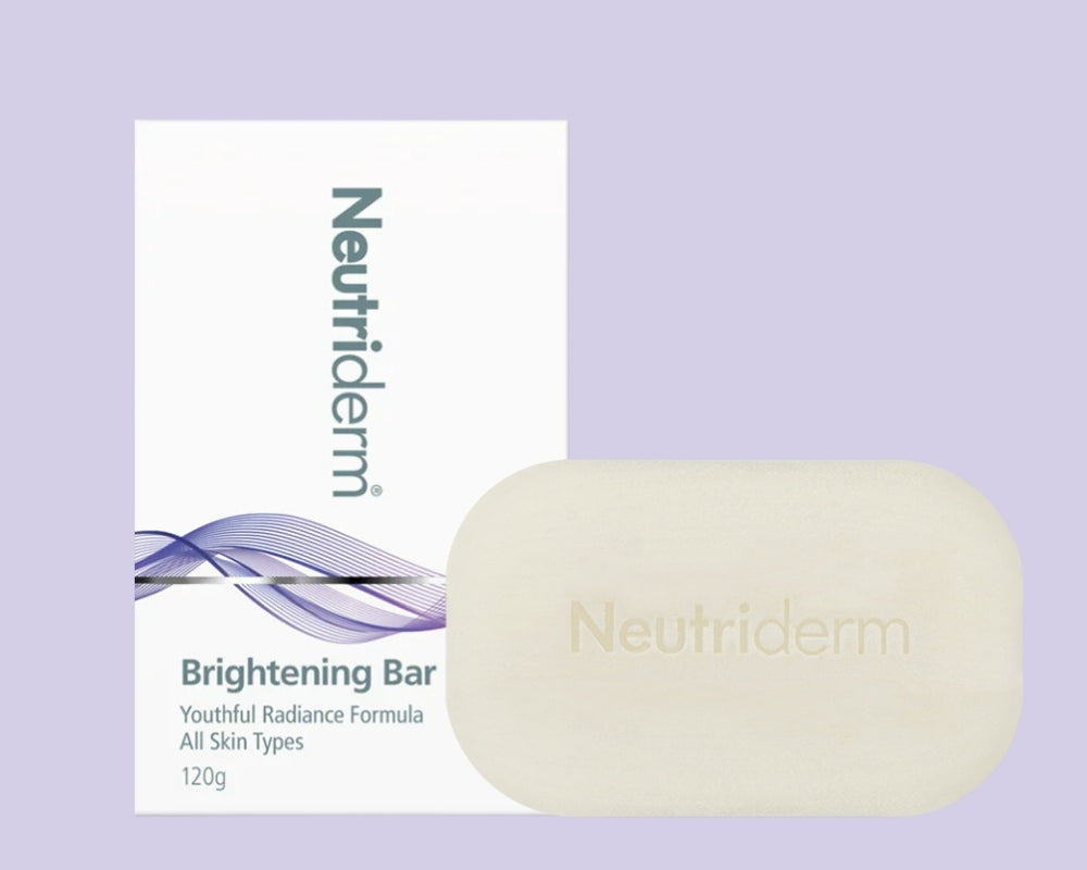 Neutriderm Brightening Bar, 120g, displayed with packaging, designed to enhance skin radiance for all skin types. 