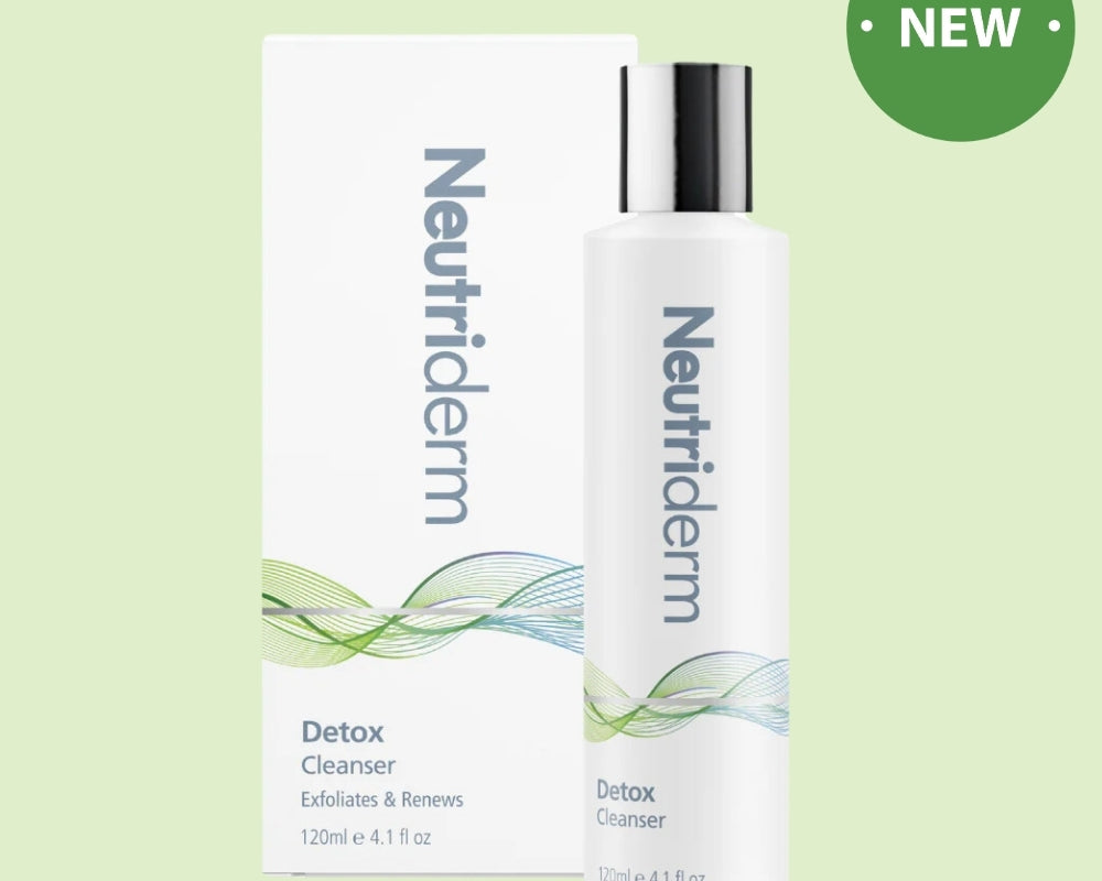 Neutriderm Detox Cleanser product image, 120 ml bottle displayed with packaging on a soft green background, featuring 'New' label on the upper right corner. 