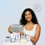 Woman holding a clutch with Neutriderm 25th Anniversary Bundle on a light blue background