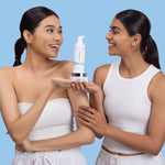 Image of 2 models smiling and holding the Neutriderm Double Cleansing Bundle including Cleansing Balm and Foaming Cleanser.